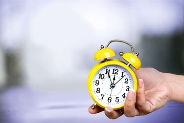 Retro alarm clock on   background