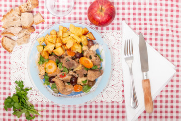 cooked meat with potatoes