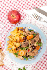 cooked meat with potatoes