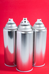 silver spray cans