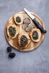 Bruschetta with black truffle ,salsa tartufata.