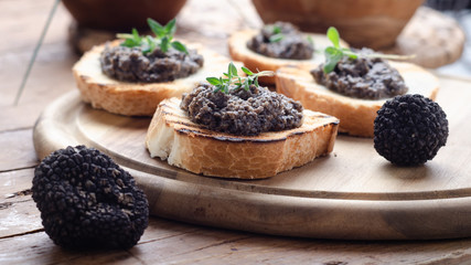 Bruschetta with black truffle ,salsa tartufata.