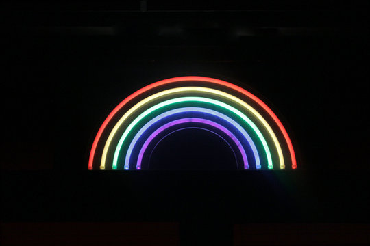 Pride Neon Rainbow Symbol On Black Background - Isolated Graphic