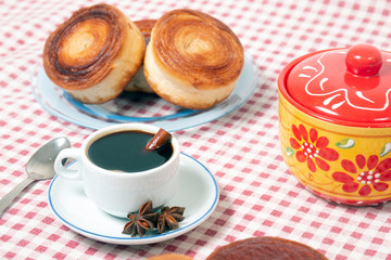 Rolled honey pastries with coffee