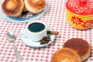 Rolled honey pastries with coffee