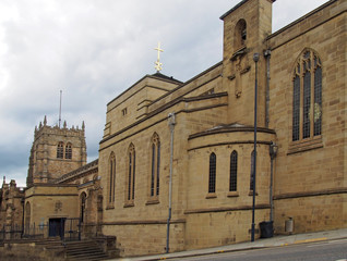 Fototapeta na wymiar a view of the medieval church of bradford cathedral in west yorkshire with main building and entrance from the street