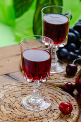Ratafia - tipical Italian sweet alcoholic beverage, either a fruit-based beverage or a fortified wine with cherries. Rustic style.