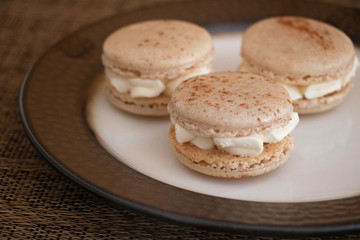 Cinnamon Bun Macaron Cookies A festive flavor. Perfect for fall or winter, Thanksgiving and Christmas. A delicate sweet treat. Baking or cooking, recipe photo.