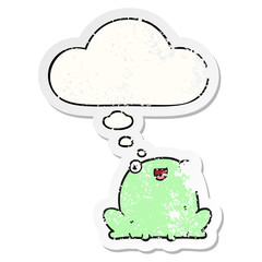 cartoon frog and thought bubble as a distressed worn sticker