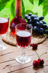 Ratafia - tipical Italian sweet alcoholic beverage, either a fruit-based beverage or a fortified wine with cherries. Rustic style.