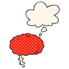 cartoon brain and thought bubble in comic book style