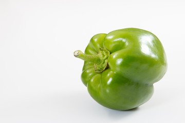 Green Bell Pepper on a white background. - 274997635