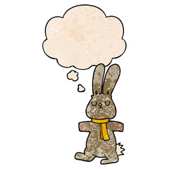 cartoon rabbit and thought bubble in grunge texture pattern style