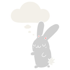 cute cartoon rabbit and thought bubble in retro style