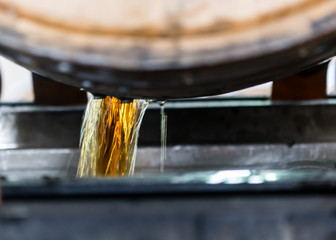 Bourbon Emptying from Freshly Opened Barrel