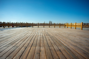 A close-up of the boardwalk on the waterfront