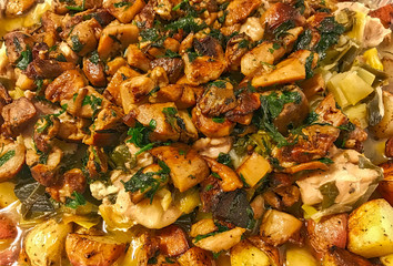 Porcini mushrooms baked with potato and herbs