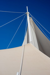 Fototapeta premium The white arbor was set against a blue sky