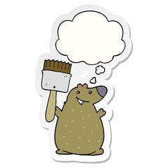 cartoon bear with paint brush and thought bubble as a printed sticker