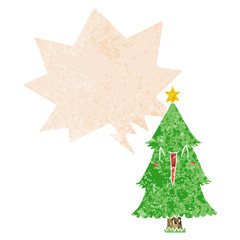 cartoon christmas tree and speech bubble in retro textured style