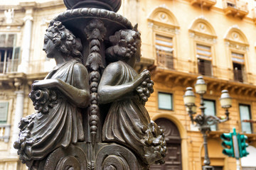Fototapeta na wymiar Sculpture in the Quattro Canti (Four Cornes) in Palermo, Italy.