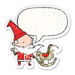 cartoon santa (or elf) making a rocking horse and speech bubble distressed sticker