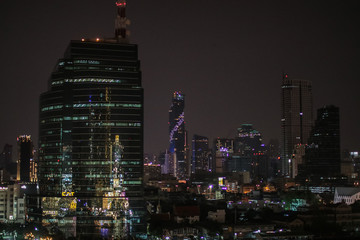 Cityscape Bangkok downtown at night.Buildings landmark of Sathorn and Silom district, This area is an important business and banking center in Bangkok.