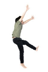 Portrait of happy little Asian child jumping isolated on white