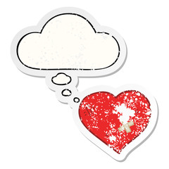 cartoon love heart with sticking plaster and thought bubble as a distressed worn sticker