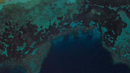 Fototapeta na wymiar Beautiful aerial view from above the trough in the blue ocean