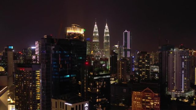 night illumination kuala lumpur downtown cityscape aerial panorama 4k malaysia
