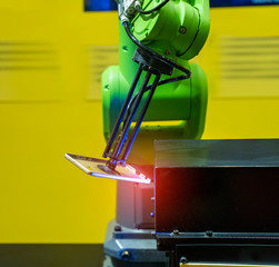automatic vision sensor machine measure the aluminum mobile phone part .