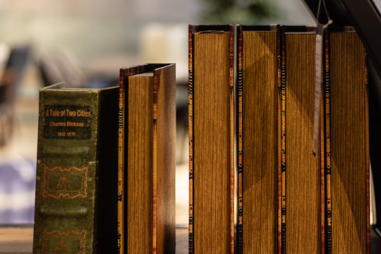 Vintage Looking Old Books On Shelf - A Tale Of Two Cities From Charles Dickens