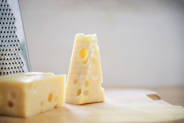 Beautiful cheeses in the kitchen - cheese food preparing concept