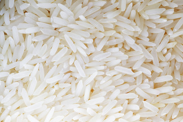close up of white rice grain background.
