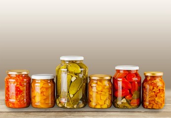 Home Canning Jars of Summer Harvest Vegetable on White Backgroun