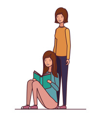 women sitting with book in hands