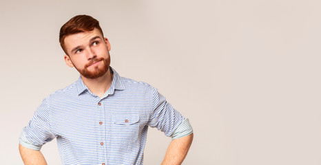 Thoughtful man looking away at copy space