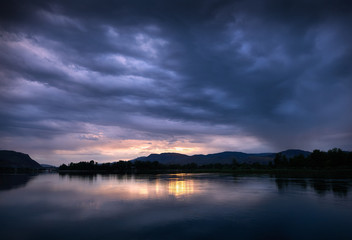 Kamloops Clouds Thompson River. Dramatic clouds at sunset over the Thompson River in Kamloops.