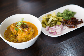 Top view  , Curried Noodle Soup with Chicken ( Khao Soi Recipe) - Thai food.