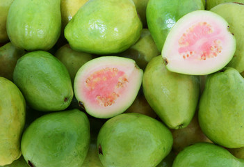 Ripe pink guava as background