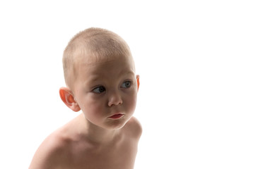 Cheerful blond blue-eyed baby on a white background