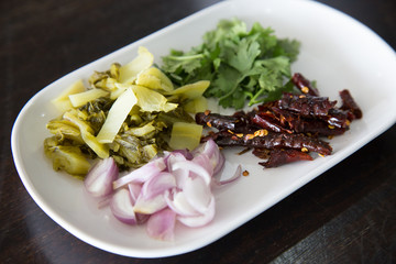 side dish / some food served on a separate plate with the main meal - Thai Food.