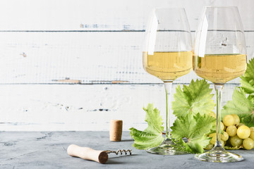 Glass of white wine on vintage wooden table. - 275023857