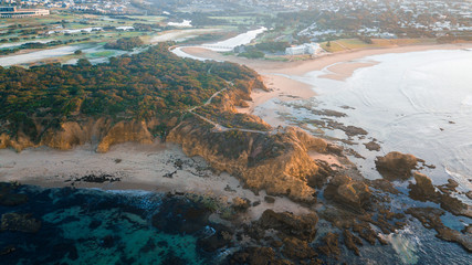 Fototapeta na wymiar Aerial View of Rugged Coastline Along the Great Ocean Road, Australia