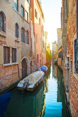 Fototapeta na wymiar old architecture and narrow canal in Venice