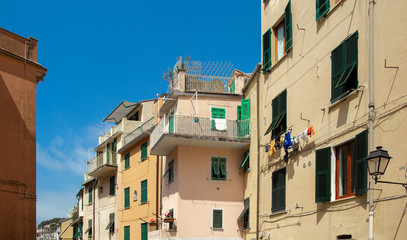 Fototapeta na wymiar Beautiful building facade in Riomaggiore, Cinque Terre, Italy. Summer cityscape