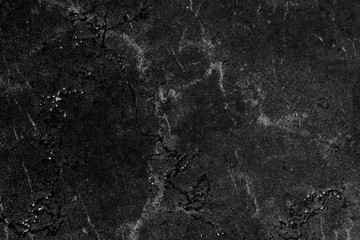 Fototapeta na wymiar Black grunge stone texture close up. Abstract background