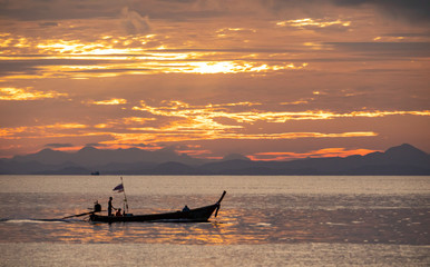 Fototapeta na wymiar Long tail boat in Andaman Sea, Thailand - tropical paradise
