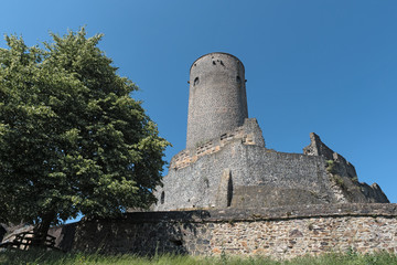 tower and wall of the ruin muenzenberg hesse germany